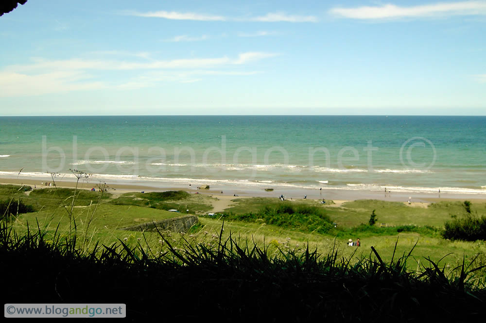 Normandy - Omaha beach through a slit bunker